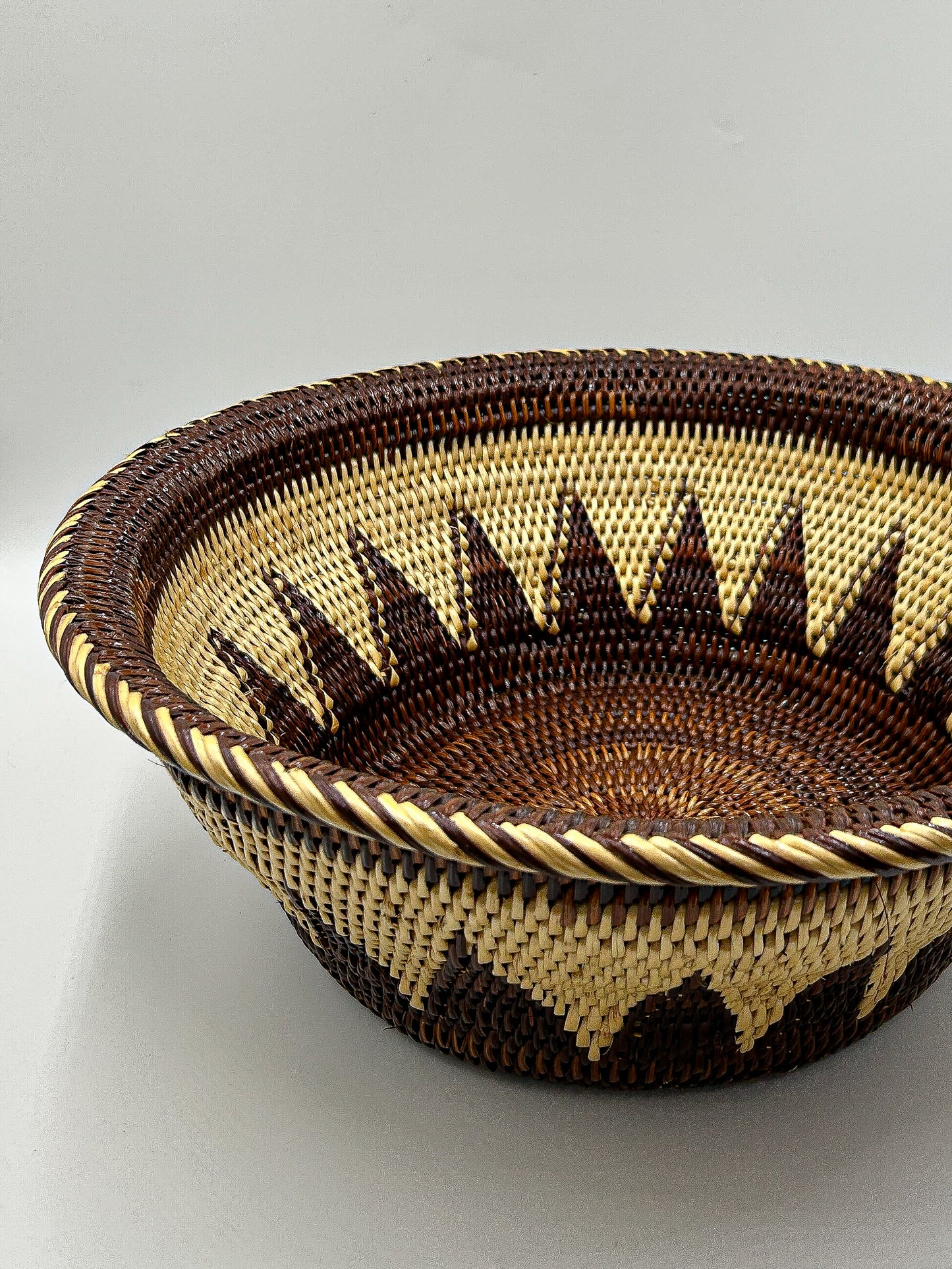 Cream and Brown Round Handwoven Basket from Papua New Guinea