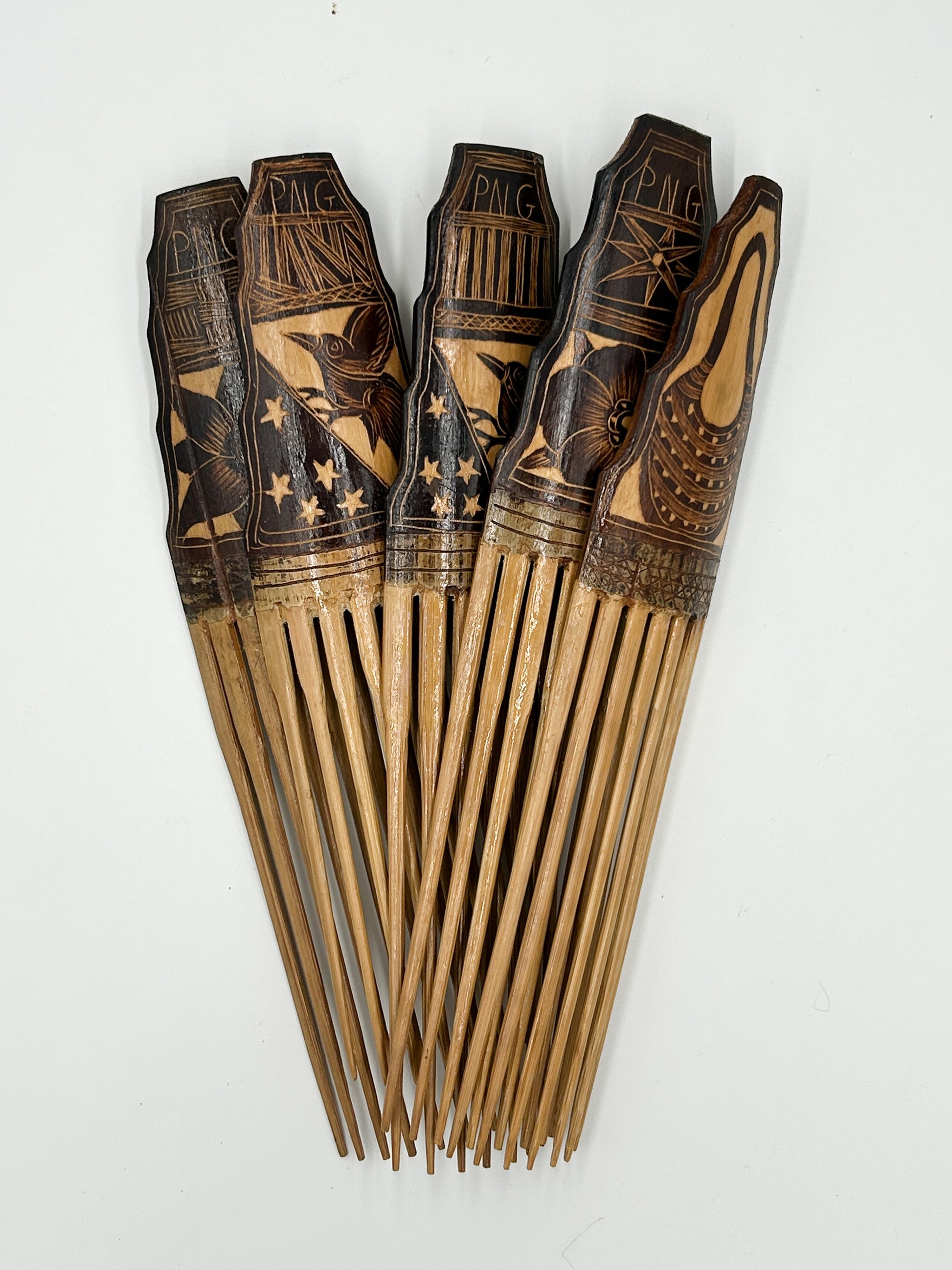 handcarved decorative hair comb from Papua New Guinea