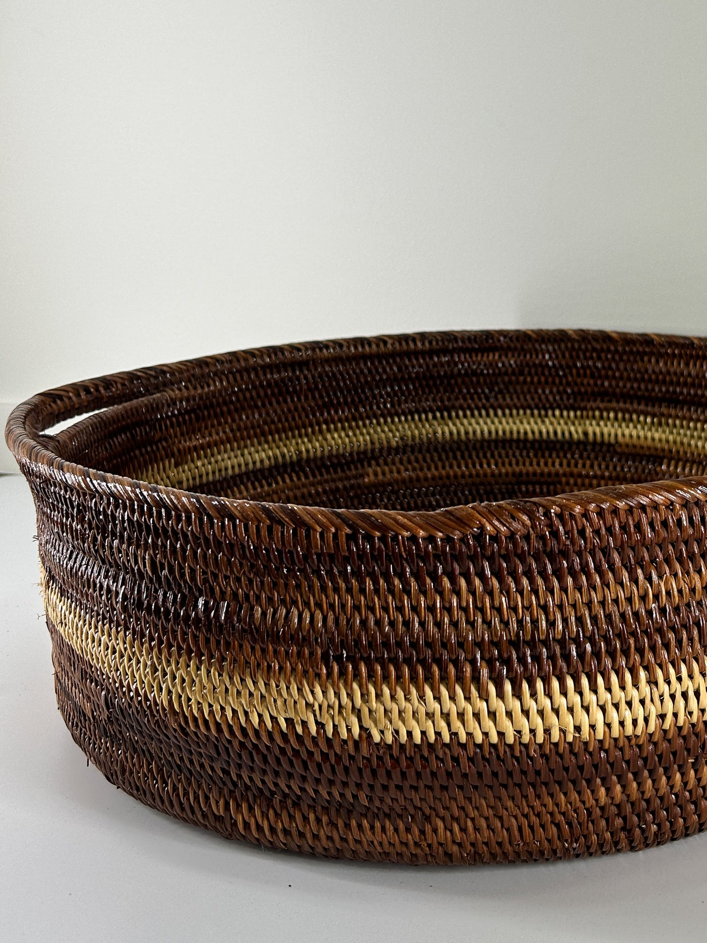 Large Round Handwoven Basket with Handles and stripe detailing